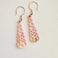 Celtic Knot earrings are carved pink shell