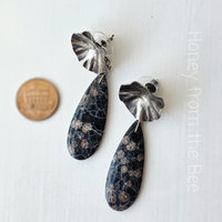 Teardrop gemstone with silver flower
