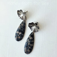 Floral earrings in silver and black