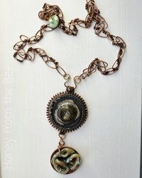 Nature inspired statement necklace in copper, ceramic and glass
