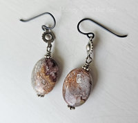 Gemstone earrings in shades of greys and reds