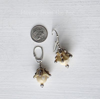 Mother of pearl earrings with lampwork in cream and silver
