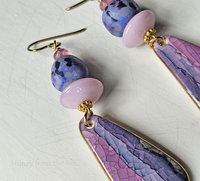 Statement earrings feature lampwork in purple and pink