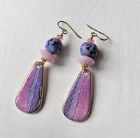 Ceramic drop earrings in pink and purple