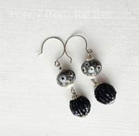 Black and white earrings in lampwork and seed beads