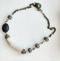 Mixed media necklace in black and white