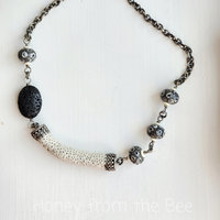 Statement necklace in black and whtie