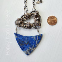 Brass, gold and blue art necklace