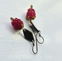 Red Raspberry earrings feature lampwork