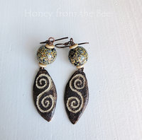 Raku lampwork earrings with ceramic drops