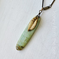 Nature pendant in green and gold