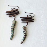 Wood and ceramic earrings in green and brown