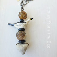 Beach pendant in white, black and yellow
