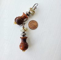 Statement earrings in brown and yellow