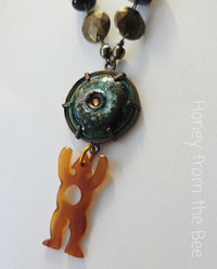 Boho style necklace in green and brass
