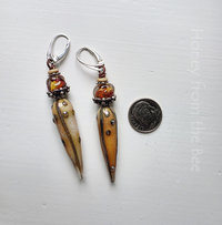 One of a kind earrings in orange, cream and silver