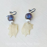 Basha bead earrings with koi fish dangles