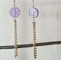 Lavender earrings feature snowflake and crystals
