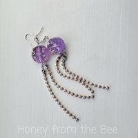 Winter earrings feature snowflake lampwork and long crystal strands