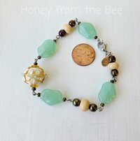 Daisy bracelet in yellow, cream and green