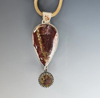 Fancy Jasper pendant set in sterling silver with gold accent and antique button dangle.