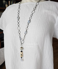 Tunic length artisan necklace on model