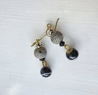 Lampwork earrings in black and gold