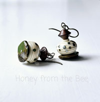 Lampwork and turquoise earrings in cream, brown, and turquoise