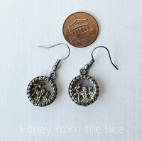 Antique button earrings set in sterling silver