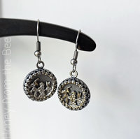 Antique button earrings with floral theme
