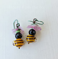 Bee earrings in yellow and black with pink flower