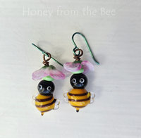 spring earrings featuring honeybees and pink flowers