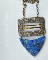 Statement necklace in brass and blue