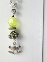 Turtle pendant with green lampwork