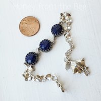 Silver and blue bracelet features lapis and sterling silver