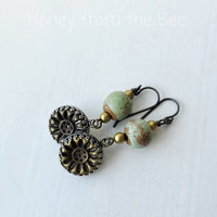 Celadon earrings with antique brass buttons