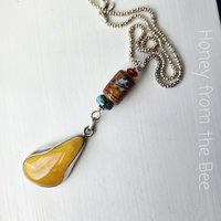 Lampwork pendant in yellow, orange and turquoise