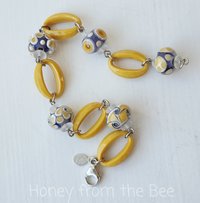 Yellow and lavender beaded bracelet