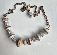 Beach artisan necklace in creams and lavender