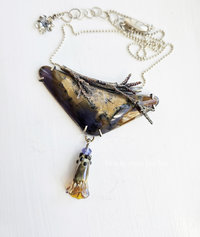 Statement necklace in purple and golden browns with nature motifs pendant necklace