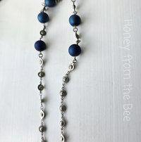conch style chain with blue beads
