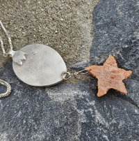 Back of sterling silver ocean inspired pendant