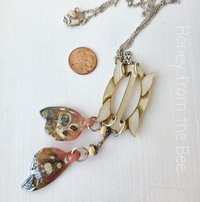 Sepia toned necklace with rosie pink butterfly wings