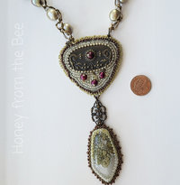 Statement necklace in brass and white and green