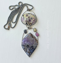 Art necklace in colorful shades of blue, purple, pink and yellow