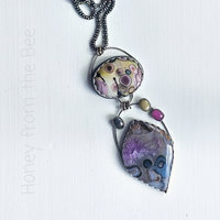Colorful Statement necklace features agate, art glass and sapphires in blue, purple, pink and yellow.