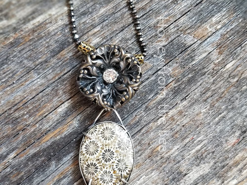 Bronze and silver necklace is really a sweet find