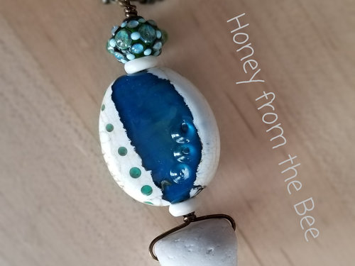 Beach pendant in blue and white lampwork