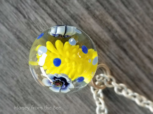 Astrid Reidel lampwork necklace in blue, yellow and white