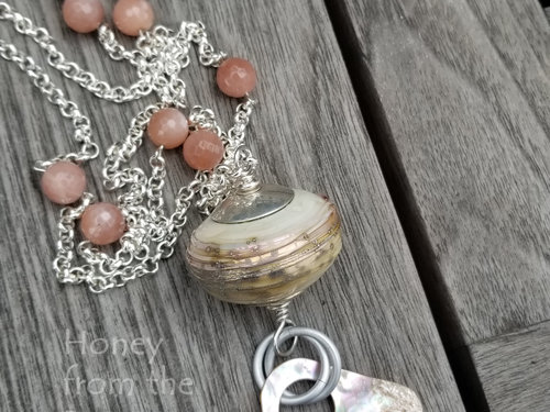 one of a kind peach and cream necklace